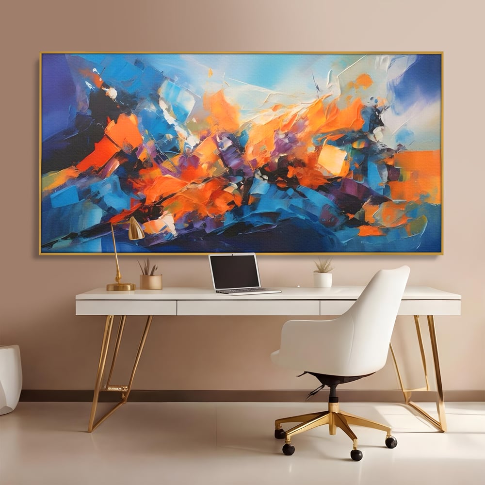 Tablou canvas cu pictura abstracta cu pete portocalii, in rama de aluminiu auriu, pe perete intr-un birou